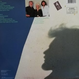 Okładka płyty winylowej artysty Kenny Rogers o tytule Eyes That See In The Dark