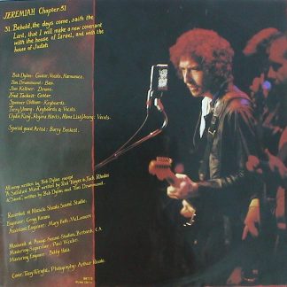 Okładka płyty winylowej artysty Bob Dylan o tytule Saved